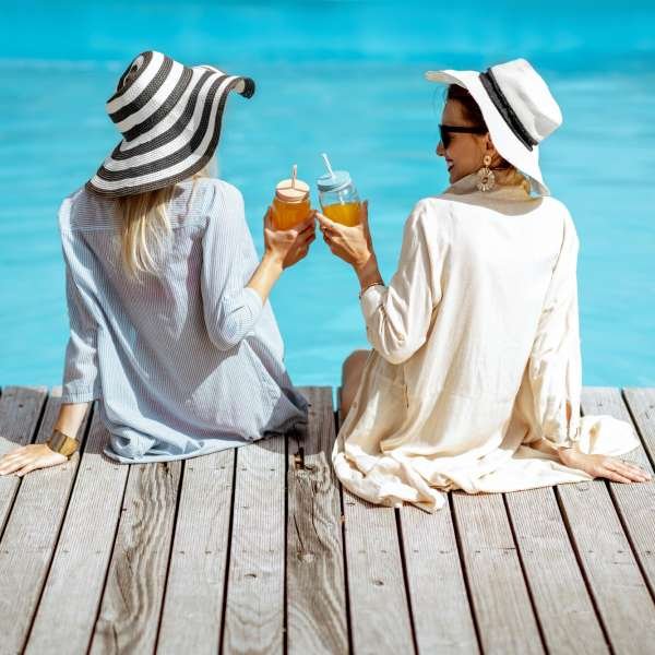 girlfriends-on-the-swimming-pool-outdoors.jpg